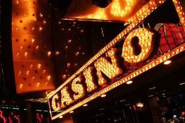 Live blackjack dealer at orca128 slot showing multi-camera studio setup with visible card deck